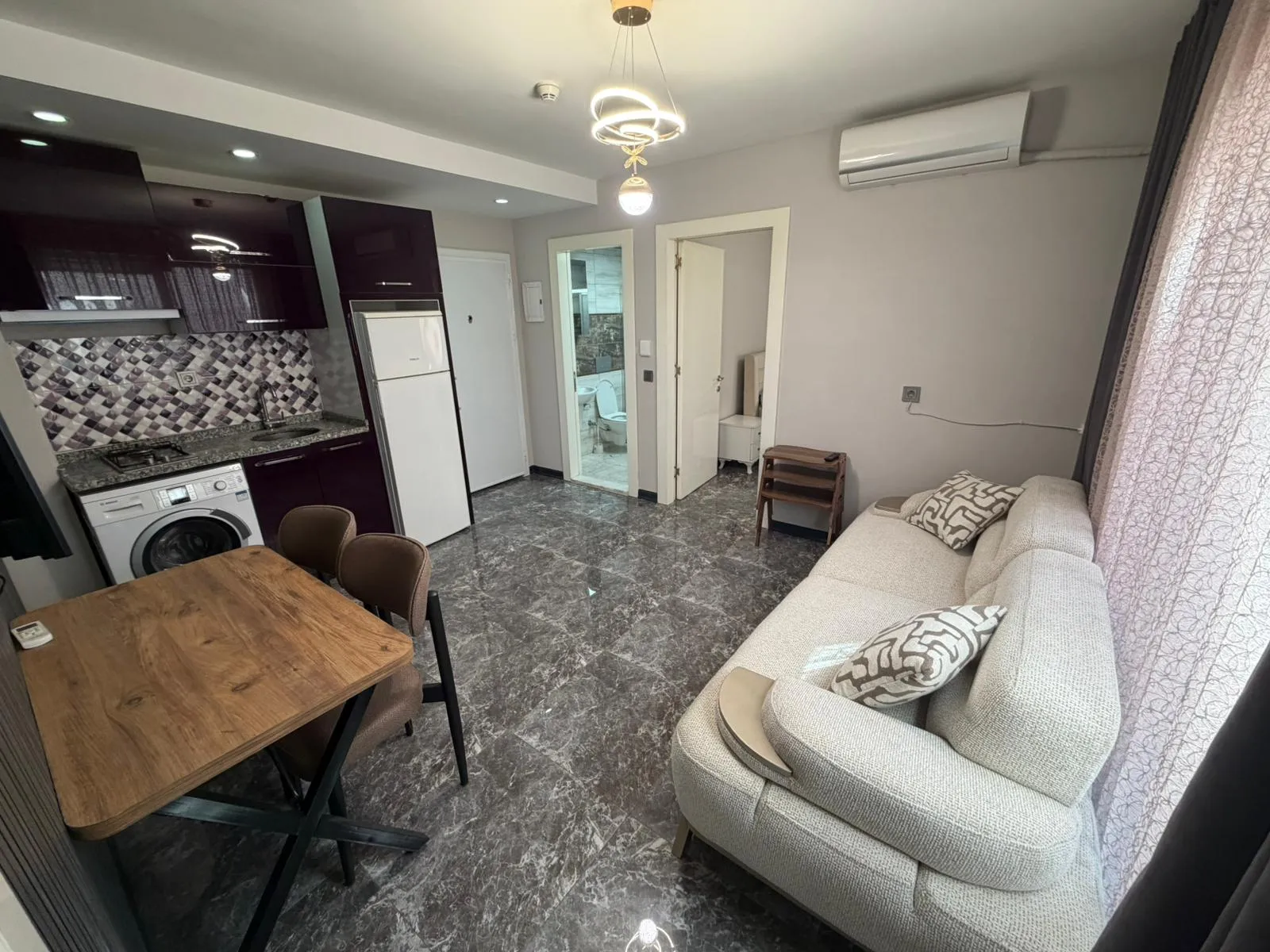 Zeytinköyde satılık 2+1 apart küçük 2