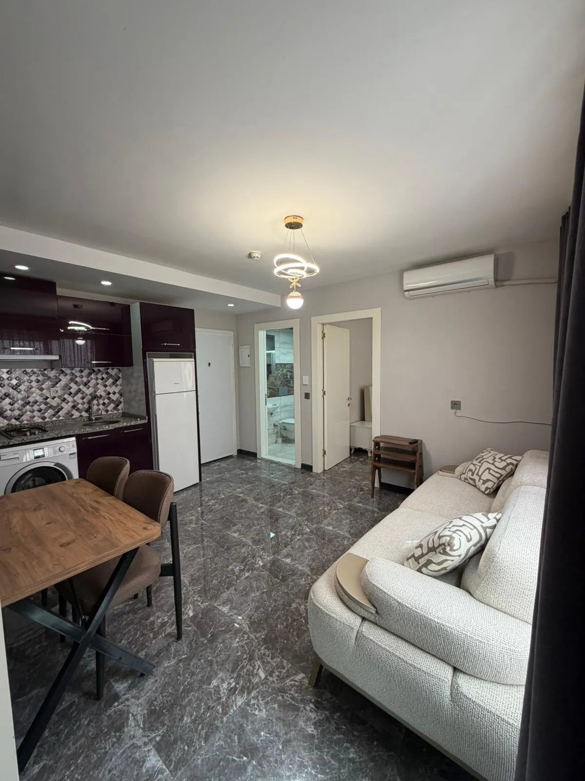 Zeytinköyde satılık 2+1 apart küçük 5