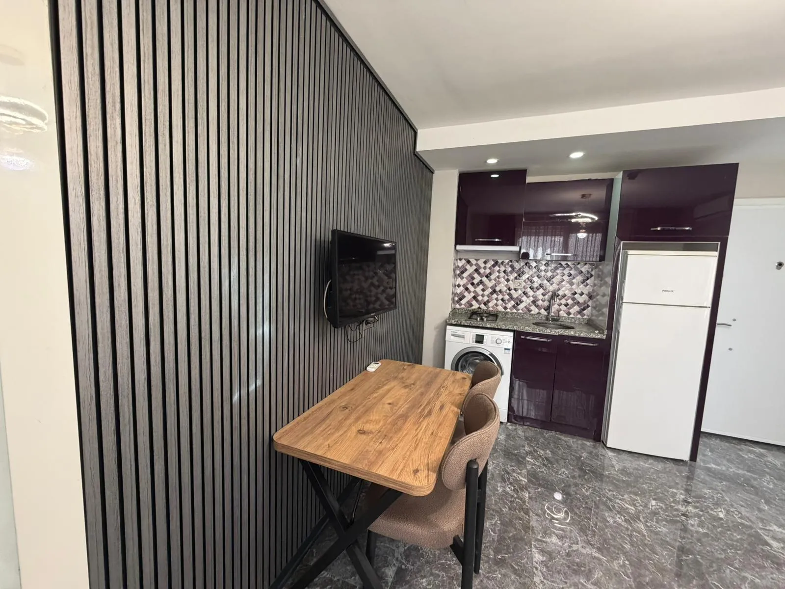 Zeytinköyde satılık 2+1 apart küçük 7